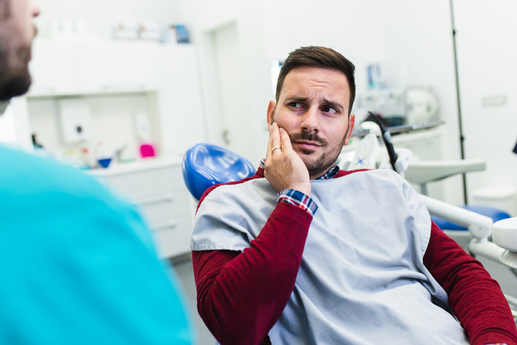 Emergency Dentist vs. Urgent Care: Where Should You Go For Tooth Pain?
