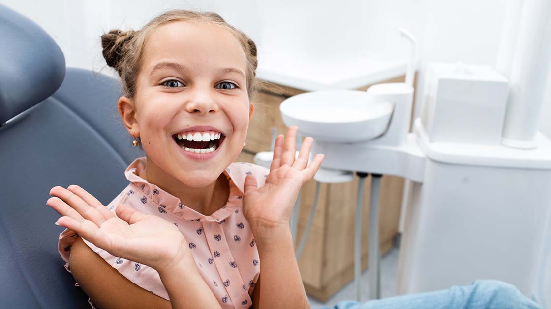 happy girl at dentist