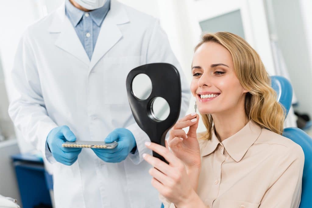 Woman looking at veneer
